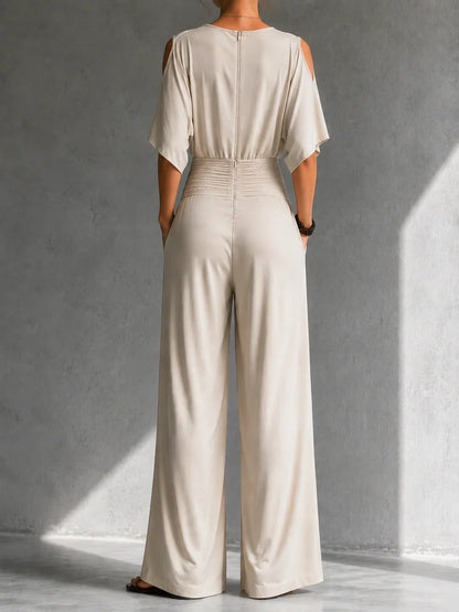 Elegante mono con efecto cruzado y pernera ancha