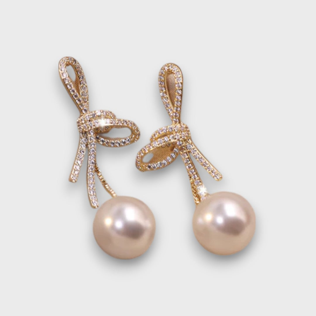 Celinea – Pendientes de lazo dorado con perla luminosa